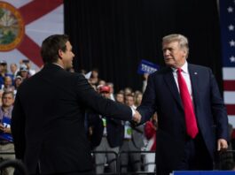 Trump and DeSantis shake hands